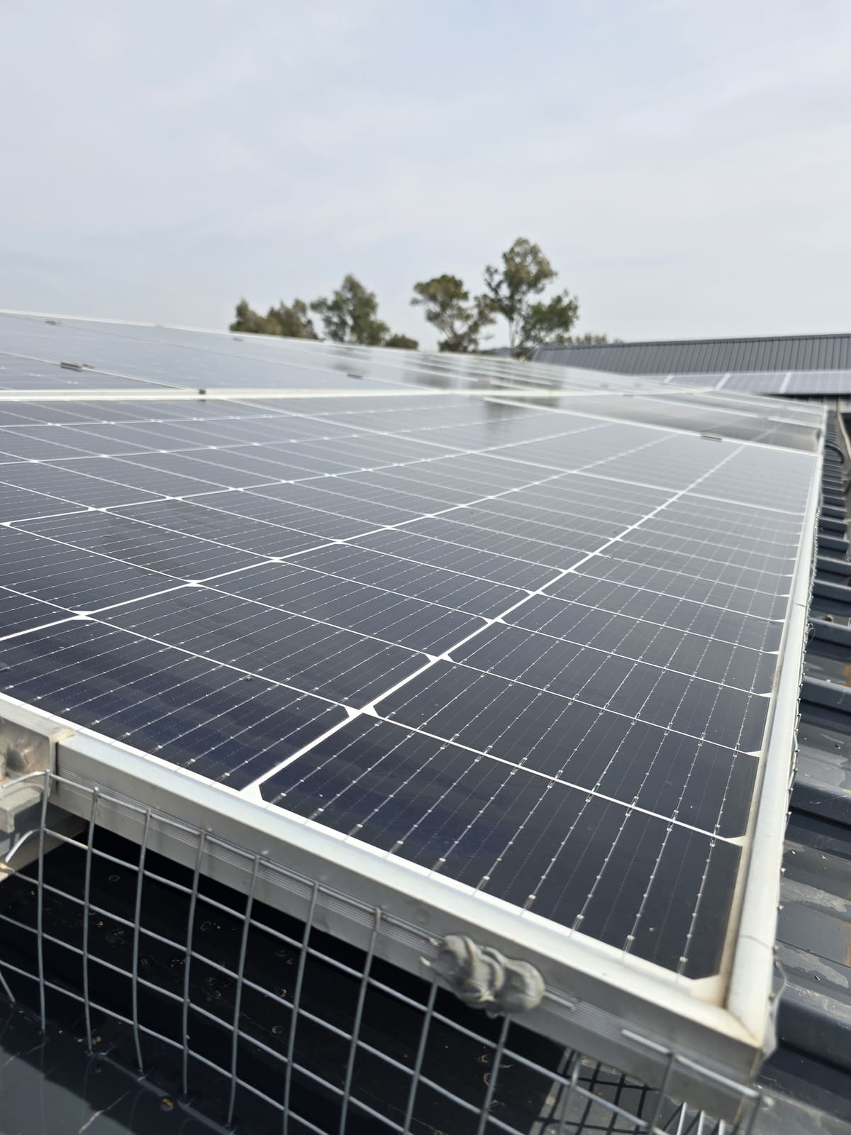Same solar panel edge spotless after cleaning